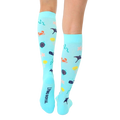 Close-up of the back of the Under The Sea Compression socks, showing the brand logo and the sock's full pattern. [lf]