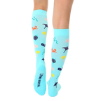Close-up of the back of the Under The Sea Compression socks, showing the brand logo and the sock's full pattern. [lf]