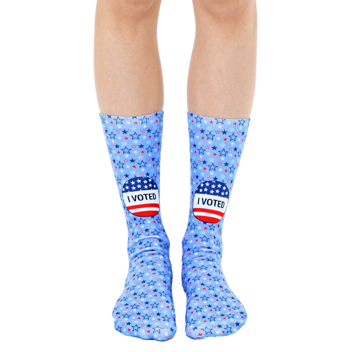 Crew socks in light blue featuring red, white, and blue stars and 'I Voted' stickers. [lf]