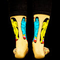 Rear view of 'Star Gazing' socks on a model, showcasing the full back design against a black background. [lf]