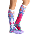 Lifestyle shot showing Dia socks on a person's legs from the side. [lf]