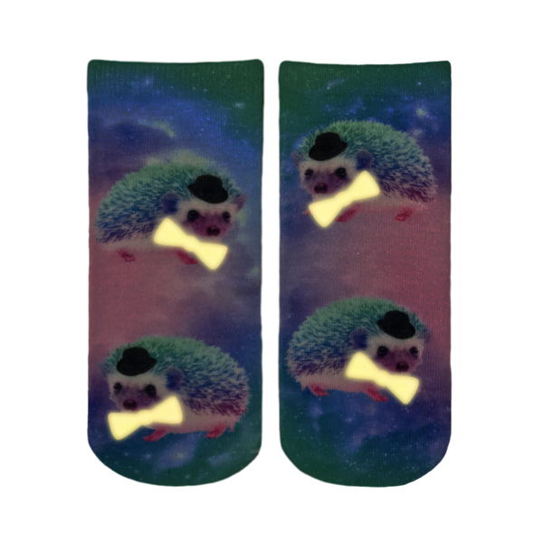 Pair of Hedgehog Glow socks shown against a dark purple background. [lf]