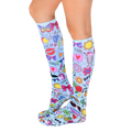 Glam Girl knee-high socks shown on a model's legs. The socks feature a light blue background with a playful, colorful design. [lf]