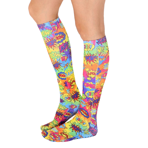 Pair of Tie Dye Pop Art knee-high socks shown from the side on a white background. [lf]