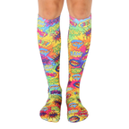 Knee-high socks in a tie-dye pattern of bright yellow, pink, and blue.  Comic book-style words like 'POW!' and 'BAM!' are printed throughout. [lf]