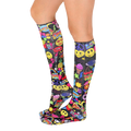 Side view of the Girls Rule knee-high socks showing the full print and fit on a model's legs. [lf]