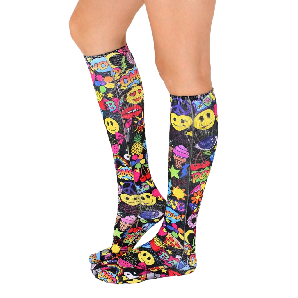 Side view of the Girls Rule knee-high socks showing the full print and fit on a model's legs. [lf]