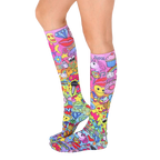 Back view of the knee-high socks, showing the full design. The pink base is covered in colorful graphics. [lf]