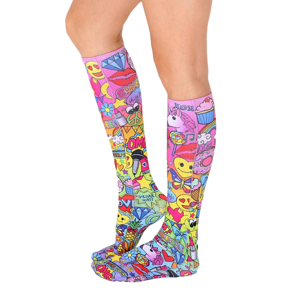 Back view of the knee-high socks, showing the full design. The pink base is covered in colorful graphics. [lf]