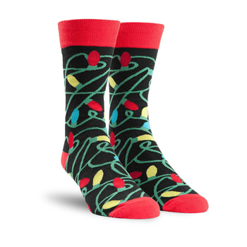 Crew socks with a tangled Christmas lights design.  Main colors are black, red, yellow, green, and blue.