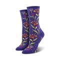 Pair of women's crew socks, purple with colorful wildflowers and yellow dots.