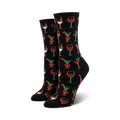 Crew socks in black with a colorful Christmas cocktail pattern. Red, green, gold, and white glasses with candy canes and bows are featured on the black background.