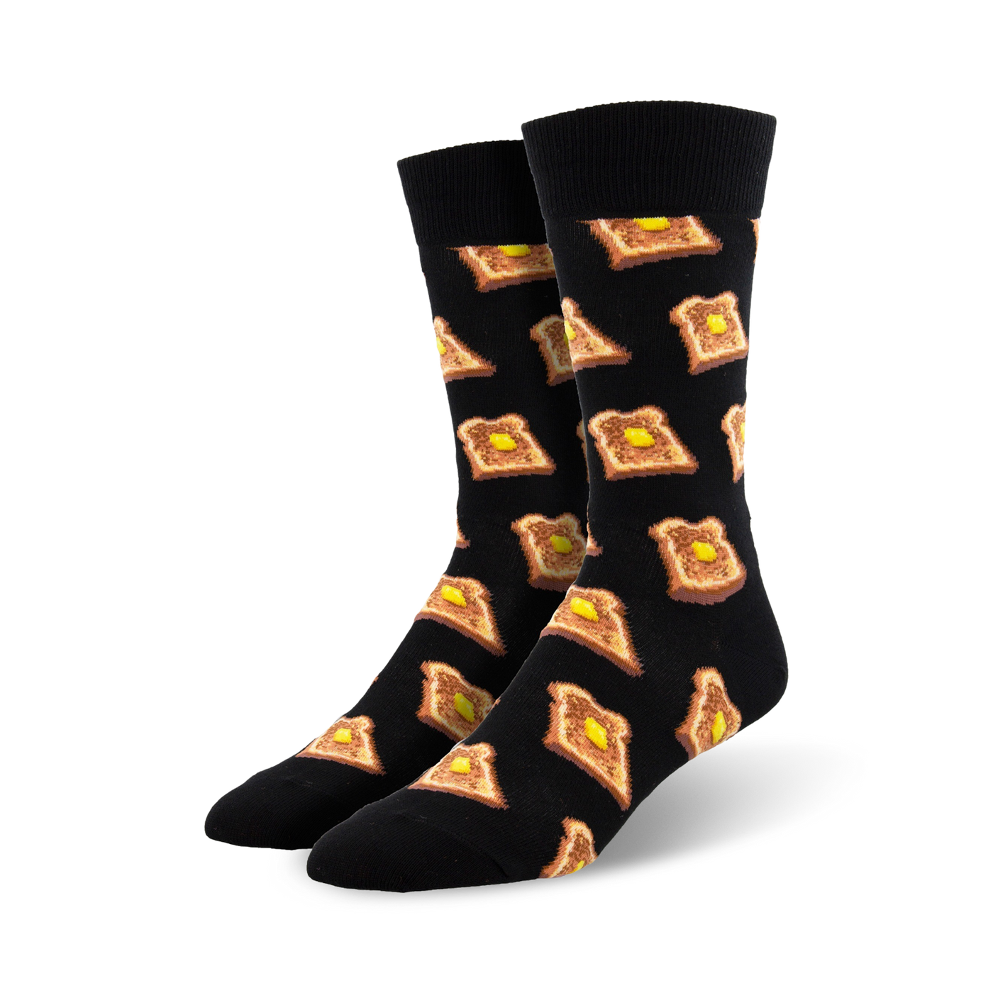 A pair of black crew socks with a repeating pattern of illustrated pieces of toast and butter. 
