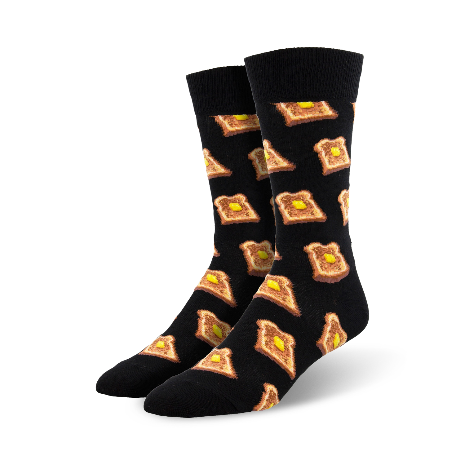 A pair of black crew socks with a repeating pattern of illustrated pieces of toast and butter. 