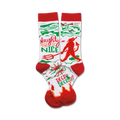 Crew socks in red, green, and white. Features a whimsical illustration of a devil and angel with the text 'Naughty or Nice'.