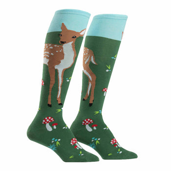 Pair of women's knee-high socks. Green background with illustrations of fawns, mushrooms, and light blue cuff.